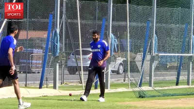 Jasprit Bumrah practices bowling at the nets.