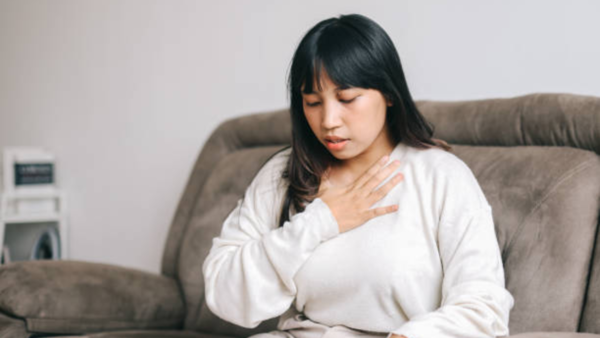 Man gasping for air, struggling to breathe