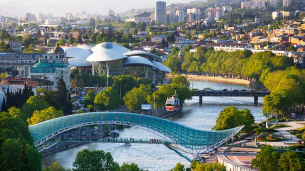 A scenic view of Tbilisi, Georgia at dusk.