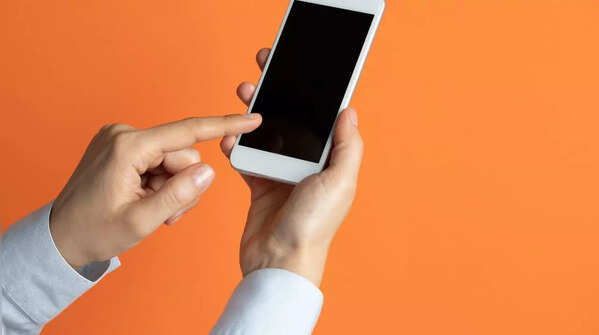 Holding phone with one hand, scrolling with the other hand's index finger.